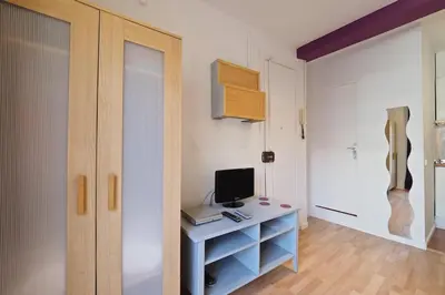a room with a desk with a computer on it at Sunny Apartments Barcelona in Barcelona
