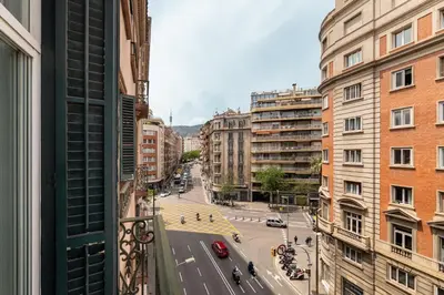 a view of a city street from a window at Balmes Apartment by Olala Homes in Barcelona