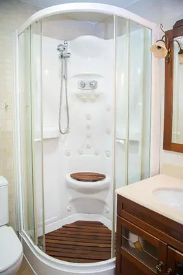 a bathroom with a shower with a toilet and a sink at Splendid Gaudi Mercat del Ninot Apartment in Barcelona