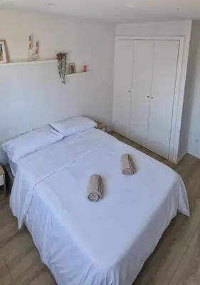 a bathroom with a sink and a toilet and a mirror at Confortable habitación doble - 1 in Sant Adria de Besos