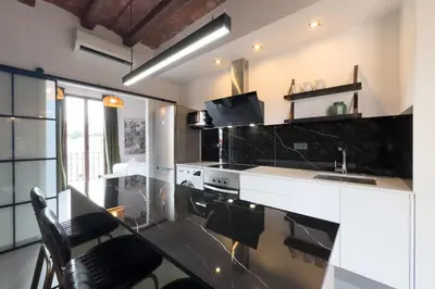 a kitchen with a sink and a counter top at Bebarceloner Poble Nou Apartments - 1 bedroom in Barcelona
