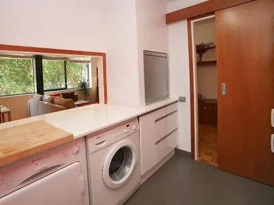 a laundry room with a washer and dryer at Apartment Vila Olimpica Pamplona by Interhome in Barcelona