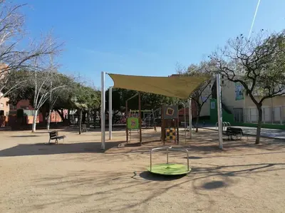 a park with a tent and a playground at Piso pl 2B, 20min Plaza Cataluña in Sant Adria de Besos