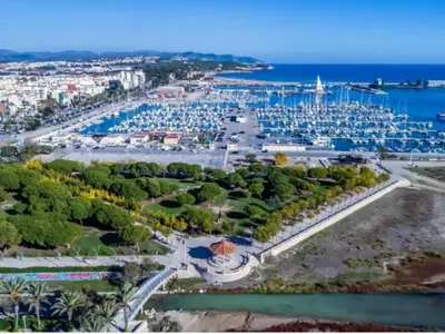 an aerial view of a harbor with a marina at Sunset Bay Vilanova in Vilanova i la Geltrú