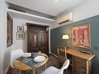 a small dining room with a table and chairs at Apolo RoofTop Barcelona in Barcelona