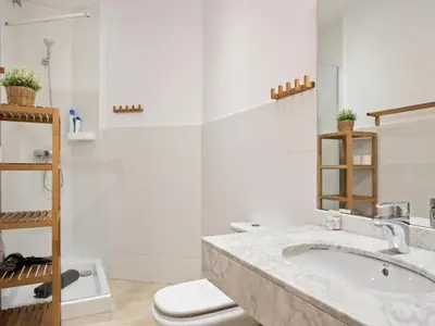 a bathroom with a sink and a toilet at Duplex Sagrada Familia 1 in Barcelona