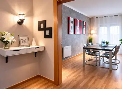 a kitchen and dining room with a table and a dining room at Piso Jùlia in Mataró