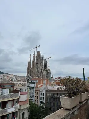 a view of a city with buildings and a cathedral at Sagrada Familia in Barcelona