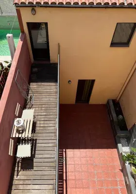 an overhead view of a staircase leading to a house at CASA NEUS, Casa única cerca de Barcelona in Sant Feliu de Llobregat