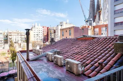 an overhead view of a building with a red roof at Centric Apartments Sagrada Famila 3 in Barcelona