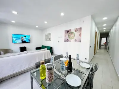 a living room with a bed and a table at Sagrada Familia Gaudi in Barcelona