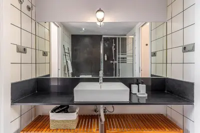 a bathroom with a sink and a mirror at 1802 - AB Poblenou Comfort in Barcelona