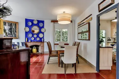 a dining room with a table and chairs at Casa en Sitges in Sitges