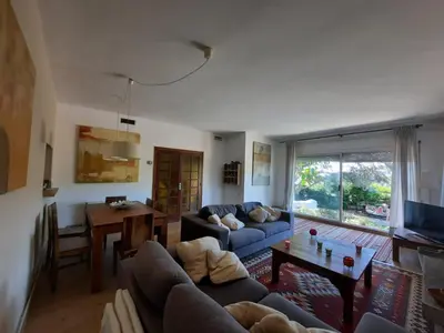 a living room with a couch and a table at Caldetas in Caldes d'Estrac
