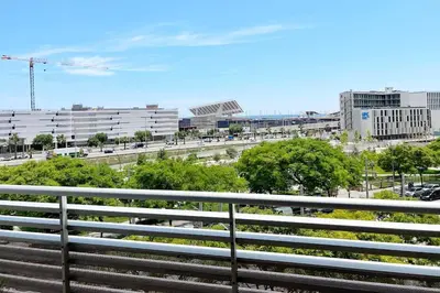 a view of a city from a fence at Ral48 in Sant Adria de Besos