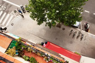 an overhead view of a train on a city street at GuestReady - Charming simplicity near Casa Milà in Barcelona