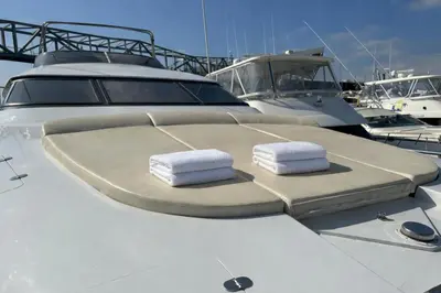a boat with two towels sitting on the deck at YACHT 20Metros in Barcelona