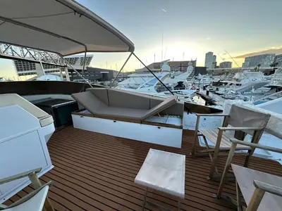 a deck of a boat with chairs and a table at YACHT 20Metros in Barcelona