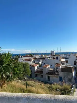 a view of a city from the road at Sitges Port View Apartment by Hello Homes Sitges in Sitges