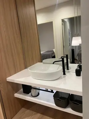 a bathroom with a white sink and a mirror at Velvet in Rambla Cataluña in Barcelona