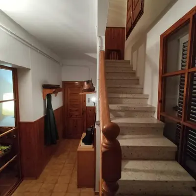 a hallway with a staircase in a house at Casa Cal Duc, la Garriga in La Garriga