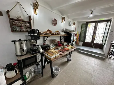 a bedroom with a bed and a couch at Vilador Beach Hotel in Masnou