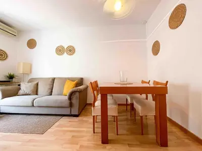 a hotel room with a bed and a mirror at Hostourist@Bcn Apartamento Monumental in Barcelona