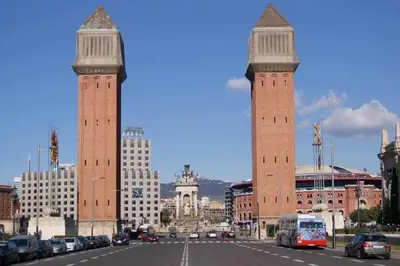 two tall towers in a city with a street at Port VII Apt centrico acogedor w balcon 23 in Barcelona