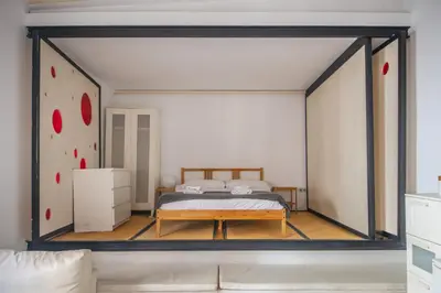 a bedroom with a bed in a room at Catalunya Casas Pied-à-terre in central Barcelona 100m from beach in Barcelona