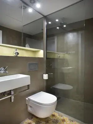 a bathroom with a toilet and a sink and a shower at Best House Best Place in Barcelona