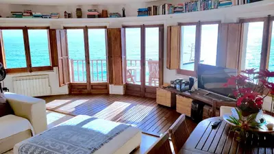 a living room with a view of the ocean at Tot Gaviota in Sitges
