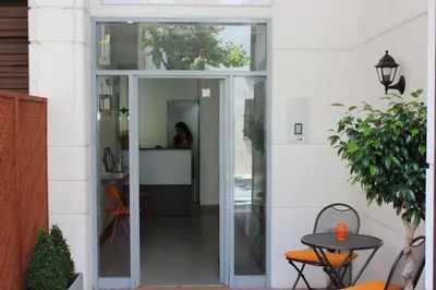 a glass door leading into a room with a table at Villa Sagrada in Barcelona