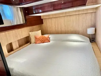 a bed in a small room in a boat at MotorYacht 21 avec équipage in Barcelona