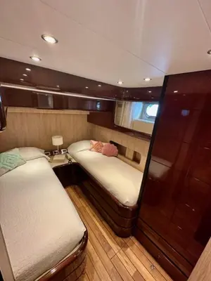 a small room with two beds on a boat at MotorYacht 21 avec équipage in Barcelona