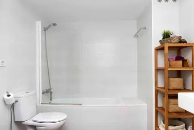 a bathroom with a shower and a toilet and a sink at Port V Apart centrico con estilo 21 in Barcelona