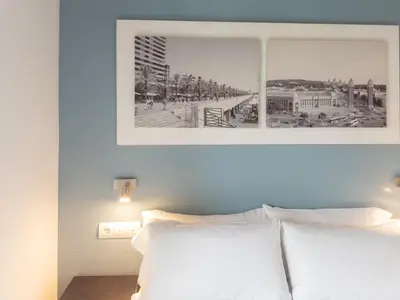 a black and white photo of a bedroom with a bed at Stay U-nique Apartments Nació in Barcelona