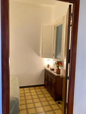a living room with a couch and a table at Piso en Poblenou, Playa a 5 min in Barcelona