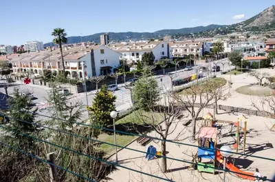a view of a park with a playground at Apartamento Cabrera Montserrat in Cabrera de Mar