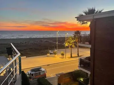 a view of the ocean from a balcony of a building at Preciosas vistas al mar en Castelldefels in Castelldefels