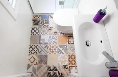 a bathroom with a sink and a toilet at The Panoramic View Born Penthouse in Barcelona