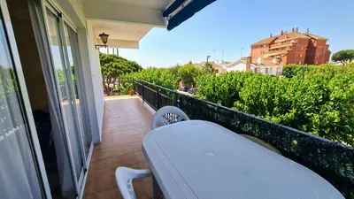 a balcony with a white bench on a balcony at Apartamento Cabrera Burriac in Cabrera de Mar