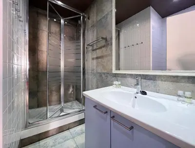 a bathroom with a sink and a shower at Stay U-nique Apartment Parallel in Barcelona