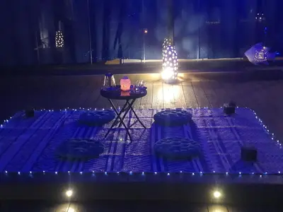 a house with blue and purple lights on a patio at Spa Ibiza Dosrius - Bungalow con Jacuzzi y Piscina privada in Canyamás