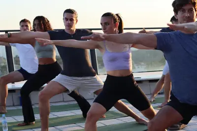a group of people in a yoga class at Circles House Coliving & Coworking in Barcelona