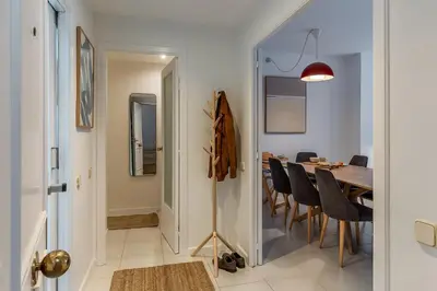 a dining room with a table and chairs at Canela Homes BARCELONA NINOT in Barcelona