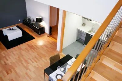 an overhead view of a living room with a table at Fira Duplex in Hospitalet de Llobregat
