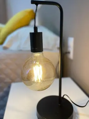 a light bulb sitting on top of a table at Nice Apartment 2 Bedrooms Well Connected in Cornellà de Llobregat