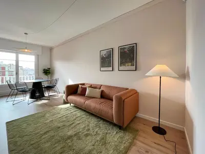 a living room with a couch and a table at Stay U-nique Apartments Gaudi I in Barcelona