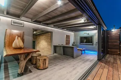 a large living room with a table and a tv at Stay U-nique Apartment Tamarit II in Barcelona