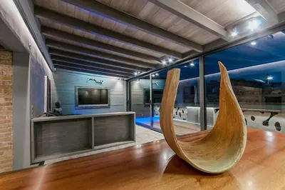 a living room with a hammock in a room with a tv at Stay U-nique Apartment Tamarit II in Barcelona